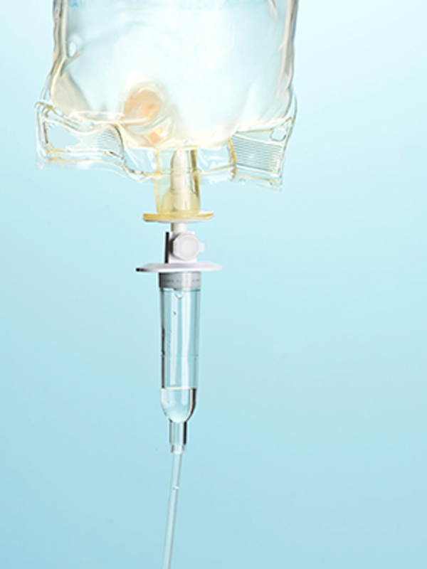 IV drip with light blue background